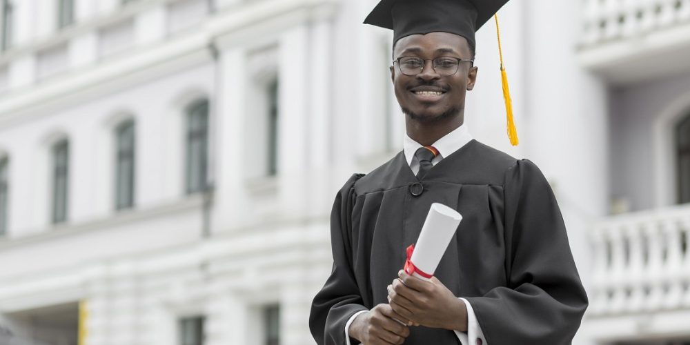 medium-shot-smiley-graduate-student